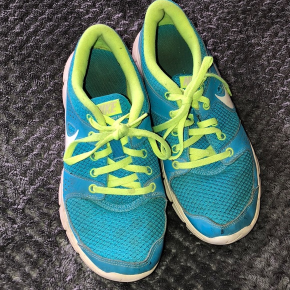 blue and lime green sneakers